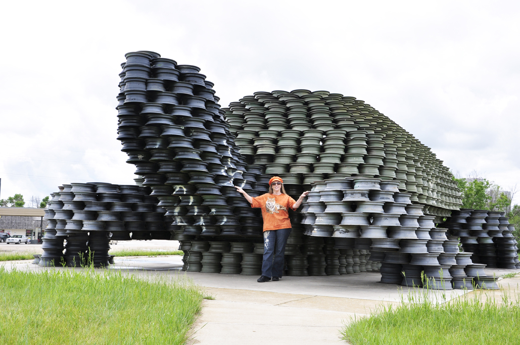 Karen Duquette with the "World's largest man-made turtle" in Dunseith, North Dakota